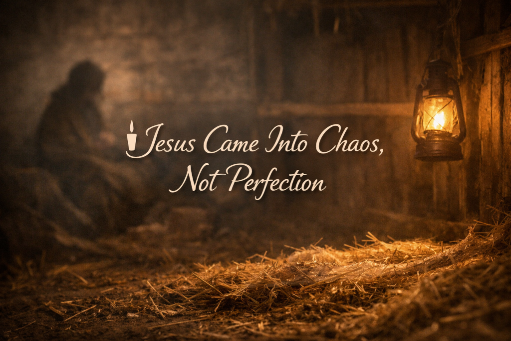 A dimly lit stable with straw-covered ground and weathered wooden walls, softly illuminated by a single lantern, evoking the raw, humble setting of Jesus’ birth.